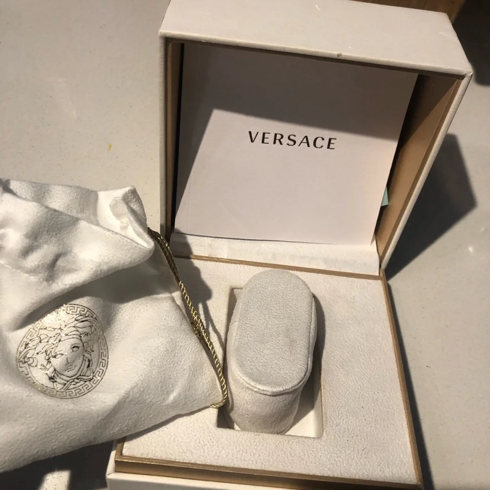 Versace White Dial Watch with Gold Bezel and Brown Strap